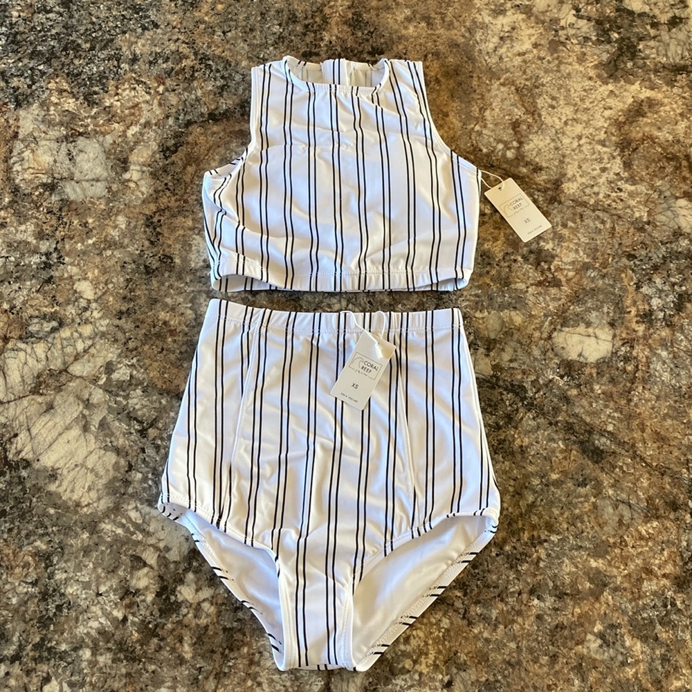 Two piece swim suit. High waist and high neck.
